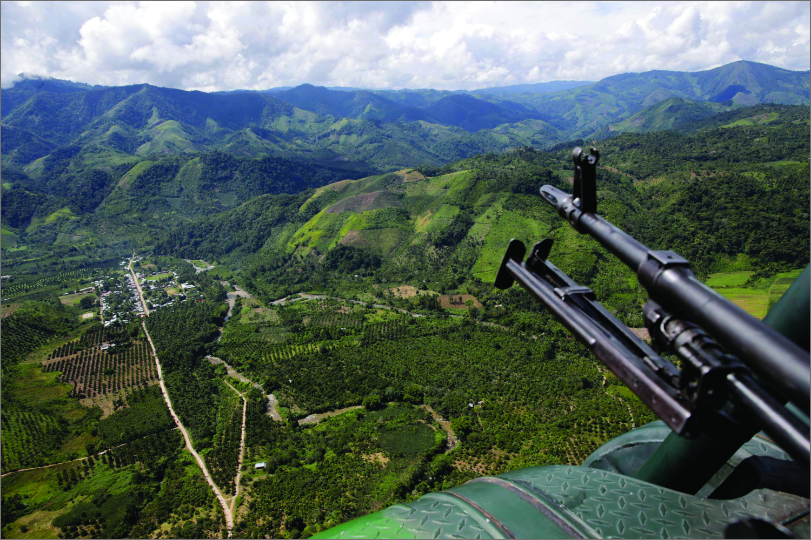 Helicopter overlooking fields